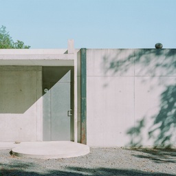 Alors Studio extends exposed-concrete home in rural France featured image